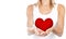 Healthy woman holding heart, selective focus