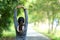 Healthy woman warming up stretching her arms. Asian runner woman workout before fitness and jogging session on the road nature par