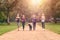 Healthy Women Jogging at the Park with a Dog