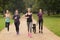 Healthy Women Jogging at the Park with a Dog