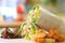 Healthy wrap with salad and croutons blurred background