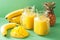 Healthy yellow smoothie with mango pineapple banana in mason jar