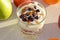 Healthy yogurt with mix of berry, sunflower seeds, bran and honey for healthy morning meal