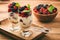 Healthy yougurt dessert with muesli, raspberries and blackberries.