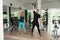 Healthy Young Couple Doing Exercise With Kettle Bell