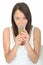 Healthy Young Natural Woman Drinking a Glass of Iced Water with Slice of Lime