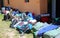 heap of backpacks used by young travelers during their traveling