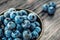 Heap of blueberries in vintage metal bowl