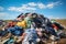 Heap Of Clothes Tossed Into Landfill