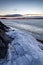 Heap of cracked ice at a frozen lake