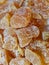 A heap of crystallized/crystallised ginger pieces