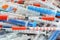 Heap of different disposable syringes