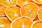 Heap of dried pieces of oranges. Close-up.