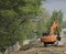 Heap Excavators digging the ground