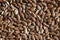 Heap of Flax seeds or linseeds background