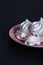 Heap of fluffy meringue on the plate