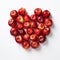Heap fresh red apples be arrange in heart shape.