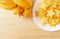 Heap of Fresh Starfruit with a Plate of Mouthwatering Juicy Slices on Wooden Background