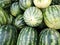 Heap of fresh watermelons full frame. Agriculture product. Organic tropical fruit.