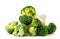 Heap of frozen broccoli and cauliflower close-up on a white. Isolated.