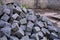 Heap of gray cobbles prepared on the construction site