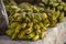 Heap of green plantains on a table