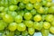 Heap of green and Yellowish grapes.