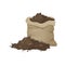 Heap of ground with worms and canvas bag for illustration of soil, organic fertilizer, compost, agriculture. Zero waste theme.