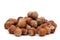 Heap hazelnuts on a white background