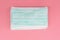 Heap Medical face mask, Medical protective mask on pink background. Disposable surgical face mask cover the mouth and