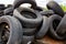 Heap of old used tires in pile