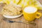 Heap of pancakes with stuffed in white plate, napkin, milk