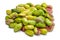 Heap of peeled pistachio nuts isolated
