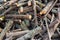 Heap of randomly piled firewood close up