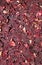 Heap of red herbal tea. Dried petals of hibiscus