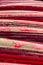 Heap of red kayaks as abstract background