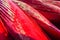 Heap of red kayaks as abstract background