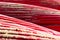 Heap of red kayaks as abstract background