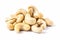 Heap of ripe roasted cashew nuts isolated on white. Generative AI