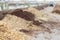 Heap of sawdust at industrial compost plant