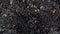 heap of sharp edged tiny particles in black colors