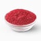 Heap of sumac powder spice isolated on white