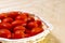 Heap of tasty red cherry tomatoes close-up. harvest farmer tomato basket