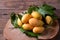 Heap of Thai plango fruit or marian plum on wood plate