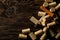 Heap of unused, new, brown natural wine corks with corkscrew on