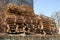 Heap of used wooden pallet at factory backyard prepared for recycling
