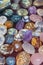 Heap of various colored gems. Colorful gemstones. Natural Polished Gemstone Semi Precious Rocks Colorful Background Texture Close