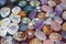 Heap of various colored gems. Colorful gemstones. Natural Polished Gemstone Semi Precious Rocks Colorful Background Texture Close