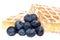 Heap of waffles with blueberries (clipping paths)