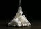 Heap of white silk cocoons on wooden table, closeup